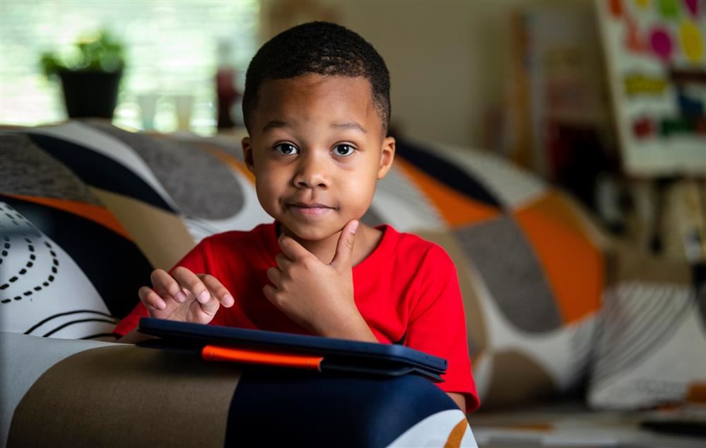 Young boy working at home Young boy working at home